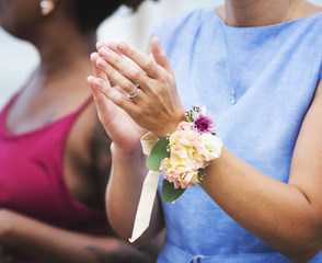 Wedding guests clapping for the bride and groom