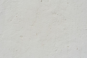 Wall fragment with scratches and cracks