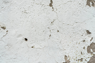 Wall fragment with scratches and cracks