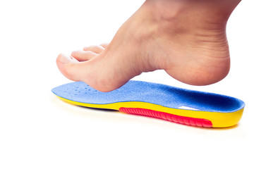 orthopedic insole and female leg