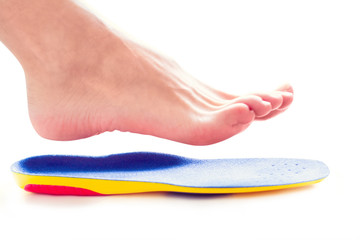orthopedic insole and female leg