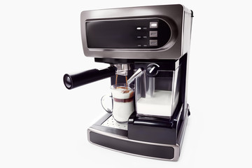 automatic coffee maker with cup of coffee