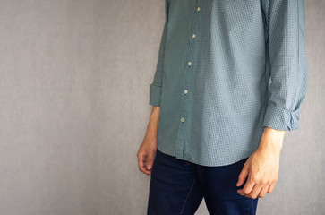 Not tucked in shirt by casual man