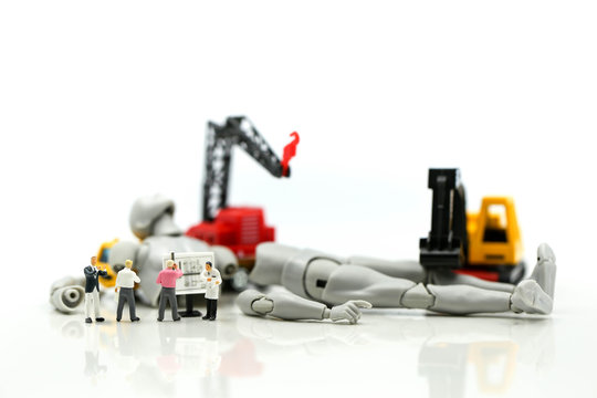 Miniature people : Businessman and Engineer deal production robots,industry  Robot Business concept.