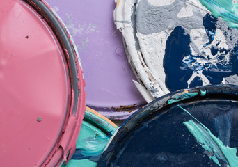 multi color old paint can lids