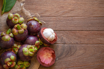 Mangosteens Queen of fruits on wooden table