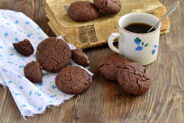 Chocolate and peanut cookies with coffee, copy space