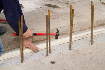 bricklayer at work in a building site