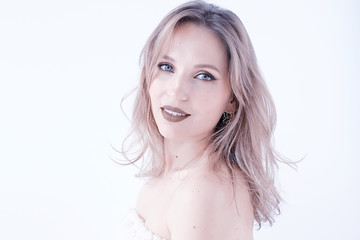 Obraz premium blonde portrait make-up white background / professional bright model make-up blond on white background, portrait of beautiful model