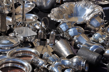 Fototapeta na wymiar Old silver dishes, flea market in Verona