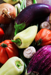 Beautiful trendy various vegetables flat lay on wooden board.