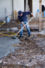 bricklayer at work in a building site