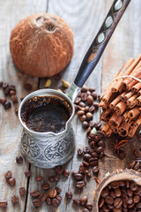 Turkish coffee theme, dark style still life decorated with spices.