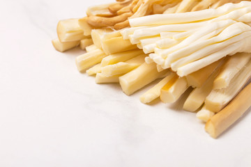 Healthy Snack. Smoked string cheese. Kobarcik. Selective focus