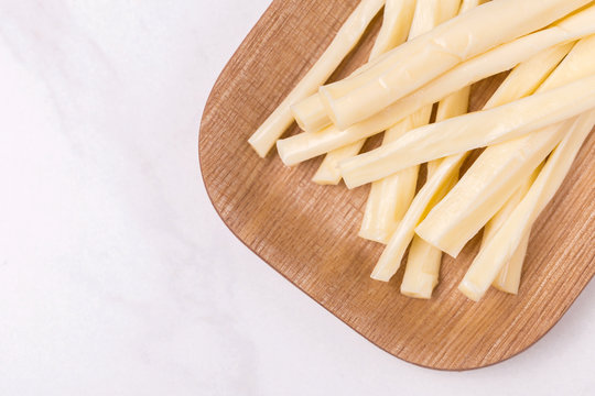 Healthy Snack. Smoked string cheese. Kobarcik. Selective focus