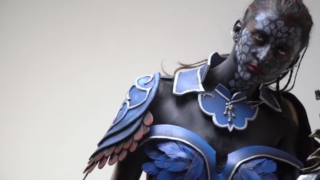 formidable woman drow with a sword, close up