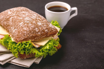 Chiabatta sandwich, coffee for Breakfast. Selective focus