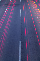 red trails on asphalt