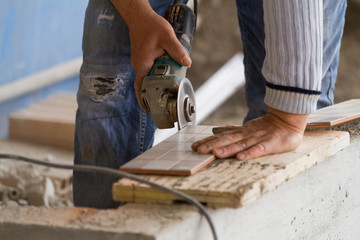 bricklayer at work in a building site