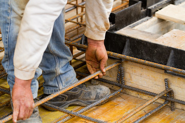 bricklayer at work in a building site