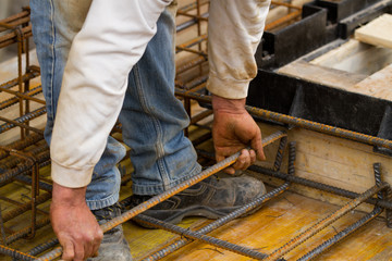 bricklayer at work in a building site
