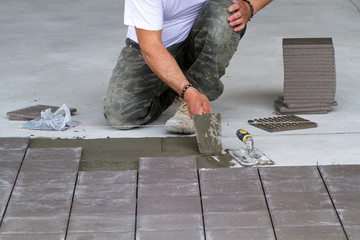bricklayer at work in building site