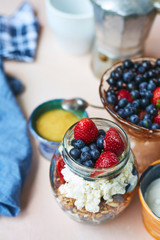 vase with fresh berries, product set for breakfast