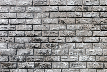 brick wall of decorative gray stone. background