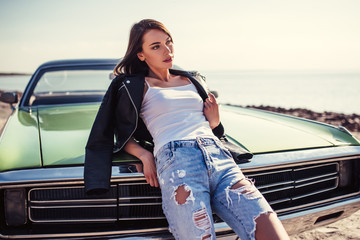 Woman with retro car