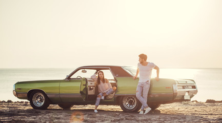 Couple with retro car