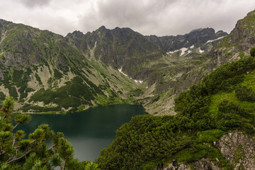 Fototapeta na wymiar Black Pond Gasienicowy and surrounding peaks. High Tatra Mountains. Poland.