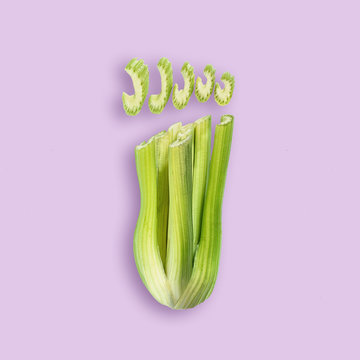Fresh stems and pieces of celery in form of foot