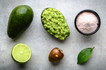 Healthy food on table, mexican guacamole with avocado, vegetarian diet concept