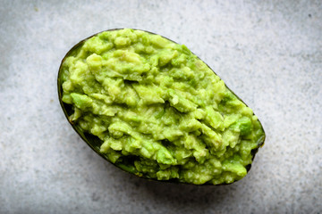 Fresh food, homemade guacamole with avocado, green sauce, vegetarian diet concept