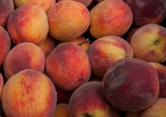 Peach peaches in the drawer, close-up photography