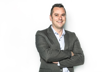 Handsome car salesman on white background