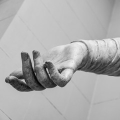 Stone statue detail of human hand