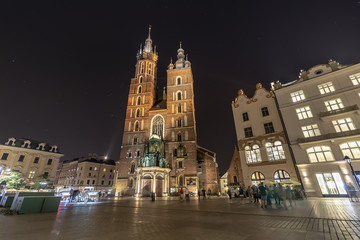 Gothic Saint Mary Basilica in city center of Krakow, Poland at night