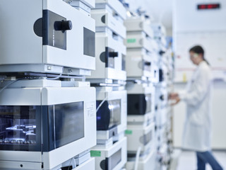 Chemical laboratory technician working in laboratory