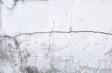 Crack texture on white old cement wall background, construction concept background 