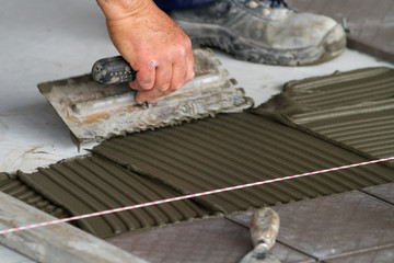 bricklayer at work in building site