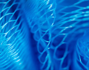 Blue synthetic sponge as an abstract background