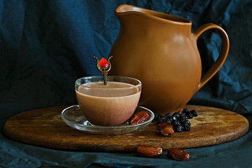 Fototapeta na wymiar hot cup with cocoa on a dark background