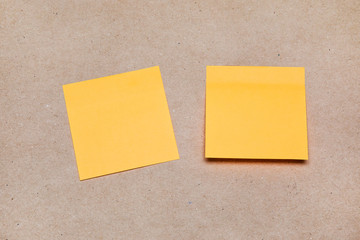 Yellow stick paper notes on white background. Can be use for your design, presentation, promo.