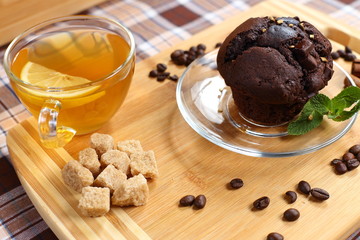 chocolate cake, tea with lemon, mint, coffee