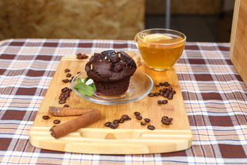 chocolate cake, tea with lemon, mint, coffee