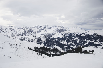 some time spent in switzerland alps while skiing, mostly cloudy weather, but beautiful landscape view of mountain peaks