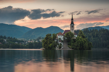 Fototapeta na wymiar Dusk over the church on the island on Lake Bled, Slovenia