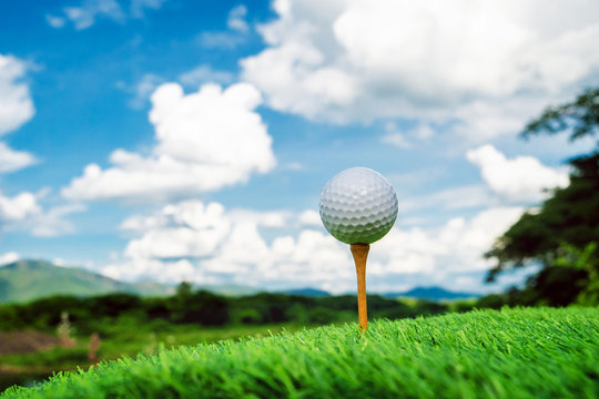 Close up golf ball with nature background.