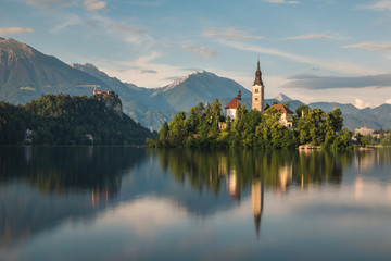 Church on the island on Lake Bled and his reflection in water, Slovenia